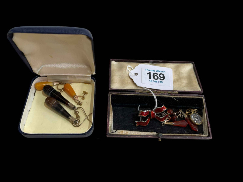 Gold mounted amber and agate earrings, silver and enamel bow brooch, earrings, and 'ladder man' locket (5).
