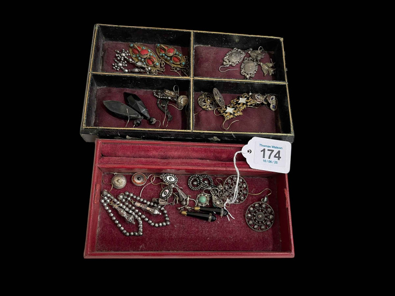 Collection of mostly antique earrings.