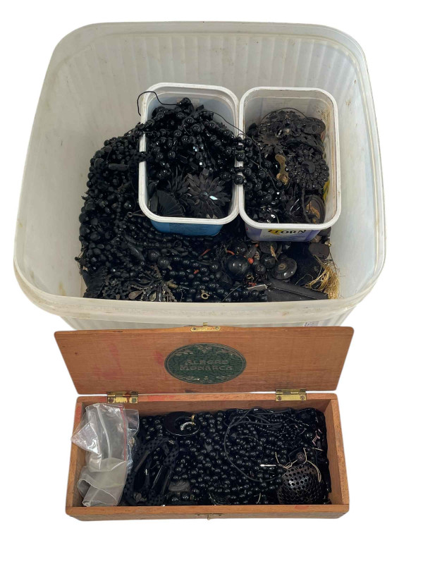 Box of largely French black glass and other jewellery.