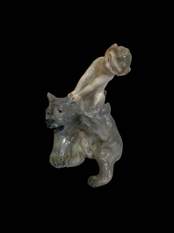 Royal Copenhagen figurine Faun Wrestling with Bear designed by Christian Thomsen, model No 1804, 20cm.