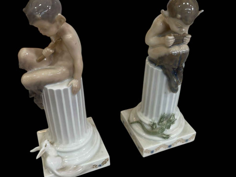Royal Copenhagen pair of Fauns on column with Lizard and Rabbit designed...