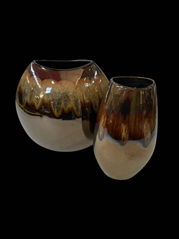 Two large Poole lustre vases.
