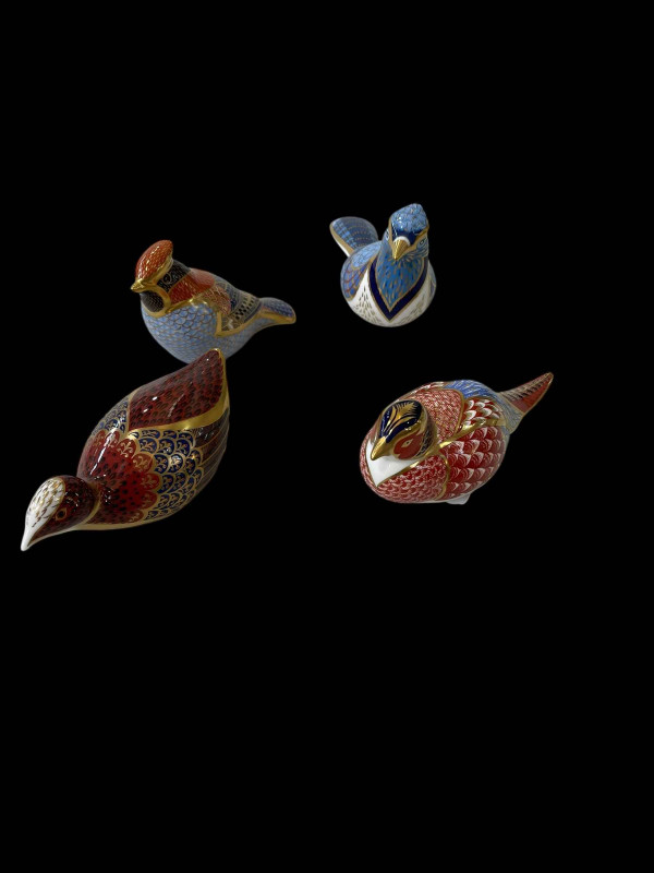 Four bird Royal Crown Derby paperweights including Pheasant.
