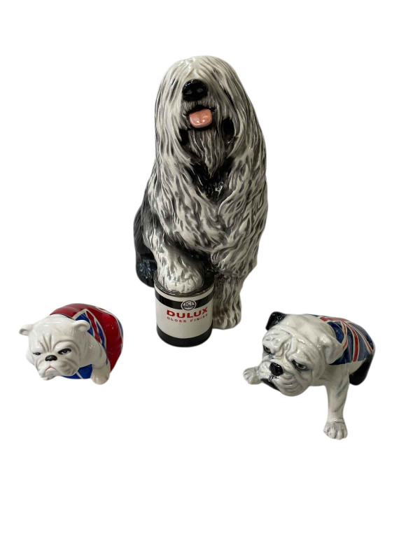 Carlton Ware Union Jack Bulldog, Royal Doulton Skyfall 007 and Beswick Dulux Dog, 33cm height (3).