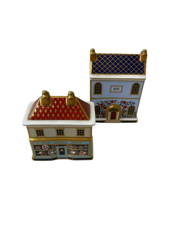 Two Royal Crown Derby paperweights, Derby House and China Shop.