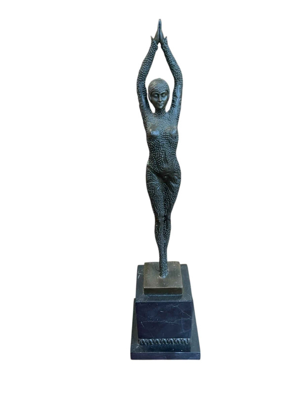 Art Deco style bronze lady in pose on marble base, 50cm high.