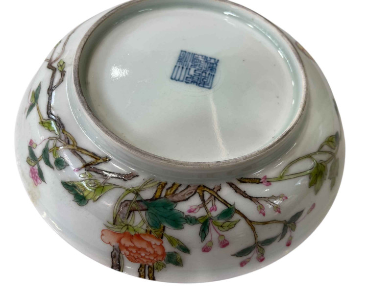 Famille rose decorated saucer dish, blue seal mark, 20cm diameter.