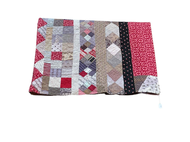 Hand stitched Durham patchwork quilt.