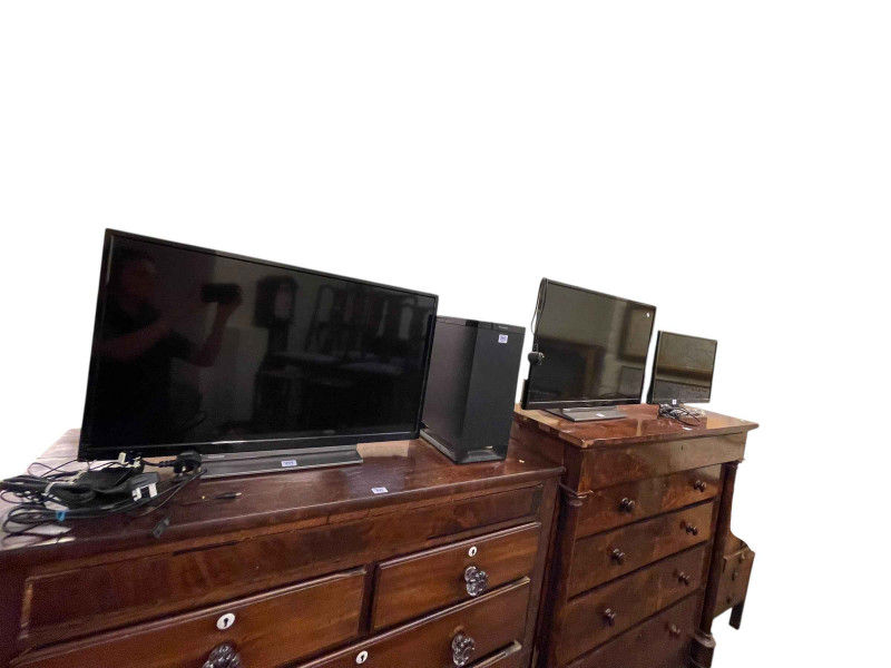 Two Panasonic and two Toshiba televisions and Panasonic Subwoofer.