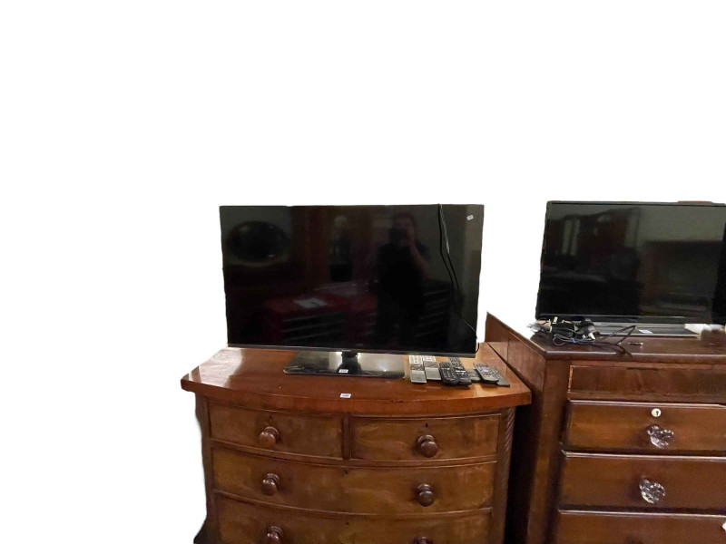 Two Panasonic and two Toshiba televisions and Panasonic Subwoofer.