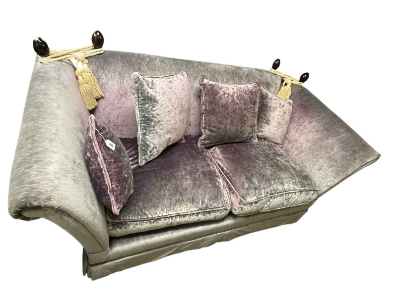 Two seater Knoll settee in lilac fabric.