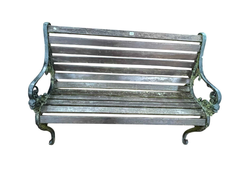 Weathered cast and wood slat garden bench, 82cm by 126cm by 66cm.