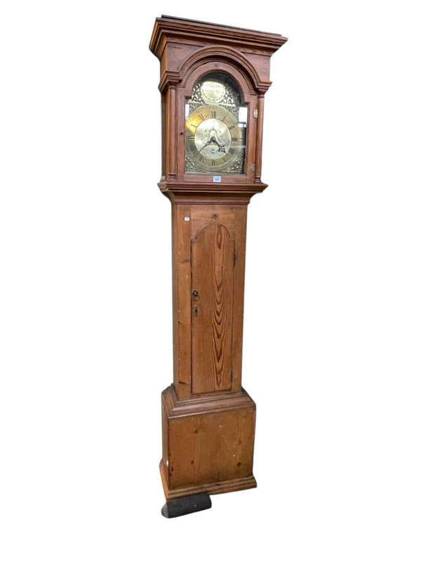 Pine 30 hour longcase clock having brass arched dial, T Calvert, Stokesley, 209cm.