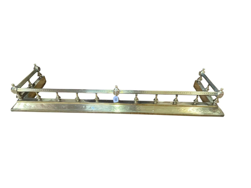 Polished brass fender, 19cm by 139cm by 37.5cm.
