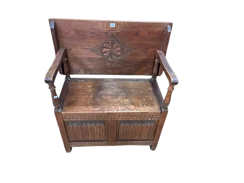 Oak double linen fold panel monks bench, 93cm by 75.5cm by 43cm (open).