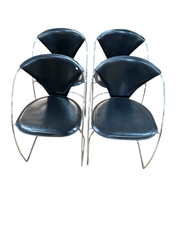 Set of four Arrben, Italy black leather and chrome 'Linda' chairs.