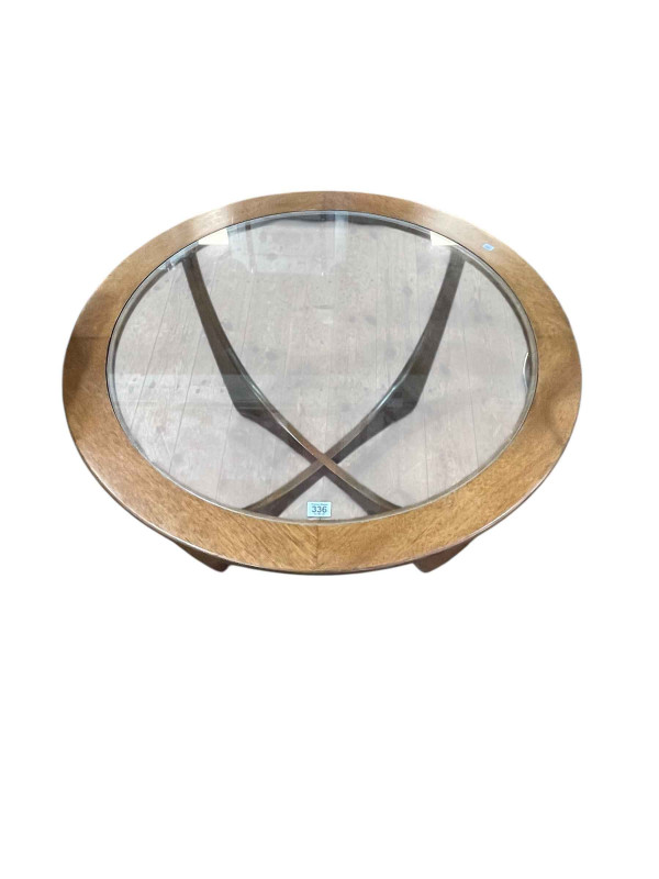 Mid Century Ernest Gomme G plan teak and glass inset top Astro coffee table, 46cm by 84cm diameter.