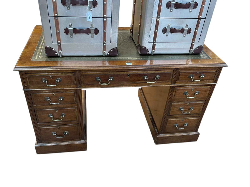 Late Victorian nine drawer pedestal desk, 74cm by 122cm by 65cm.