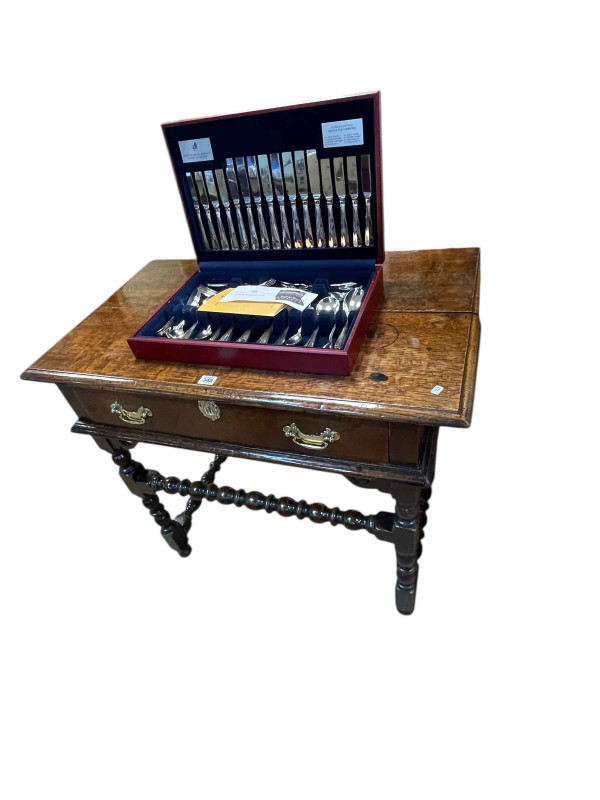Antique jointed oak single drawer side table on bobbin legs, joined by bobbin stretchers, 79cm by 90.5cm by 54cm.