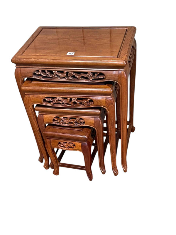 Quartetto nest of Oriental hardwood tables, largest 66.5cm by 50.5cm by 35.5cm.