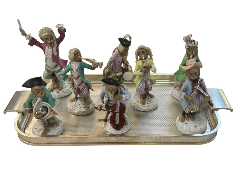 Eight Meissen Pottery Monkey Band figures.
