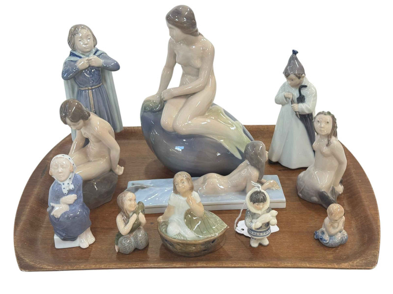 Eleven Royal Copenhagen figures including The Little Mermaid 4431, Mermaid in Water 1212 and Girl on Stone 4027.