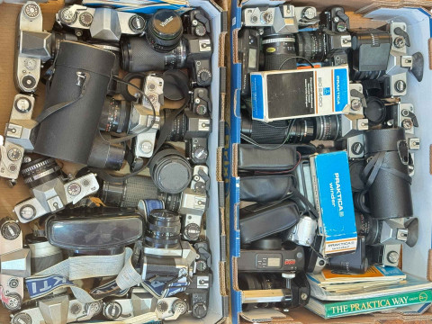 Two boxes of Practika camera, lenses, etc.