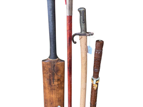 Don Bradman cricket bat and three various swords.