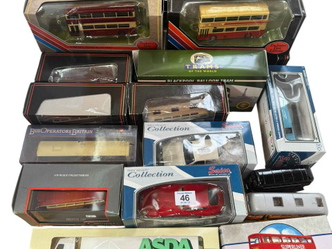 Four model trains, EFE and other model buses, tram, Asda Wagon and cars.