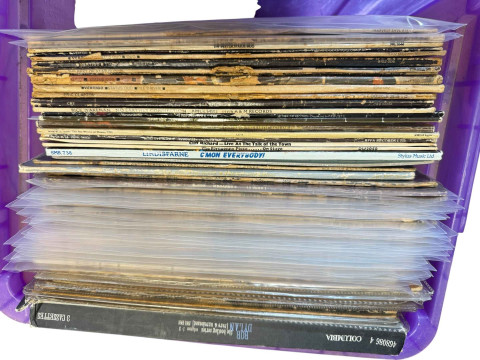 Box of LP and single records.
