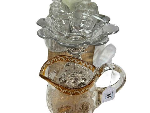 EPNS and glass centre piece, three decanters, engraved jug and large stemmed...