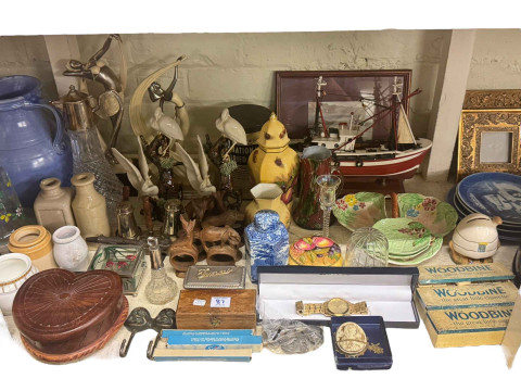 Collection of postcards, cigarette cards, FDC's, Cottage china, boxed Worcester commemorative cups and saucers, clocks, books, china, glass, two wall mirrors, etc. thumbnail