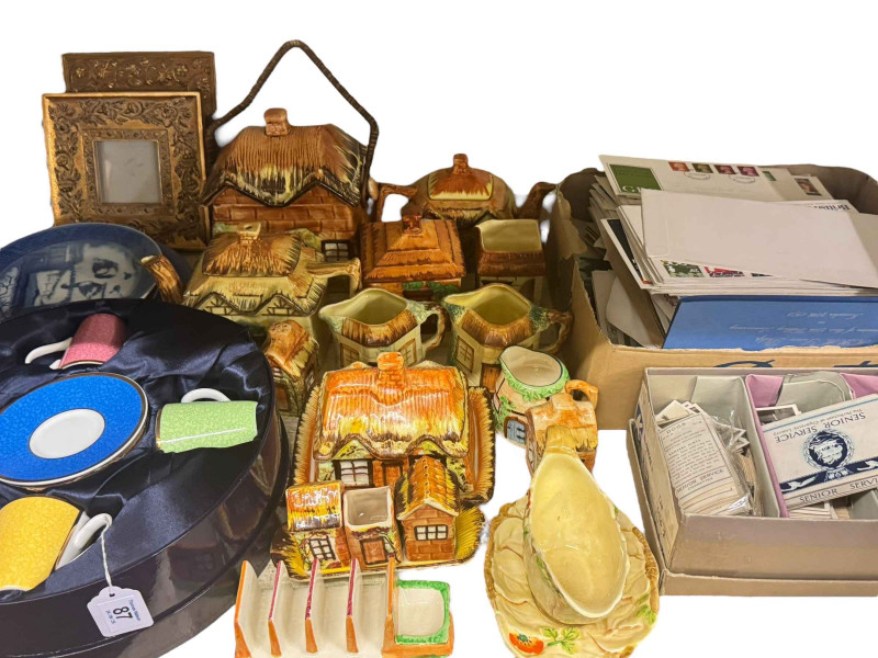 Collection of postcards, cigarette cards, FDC's, Cottage china, boxed Worcester commemorative cups and saucers, clocks, books, china, glass, two wall mirrors, etc.