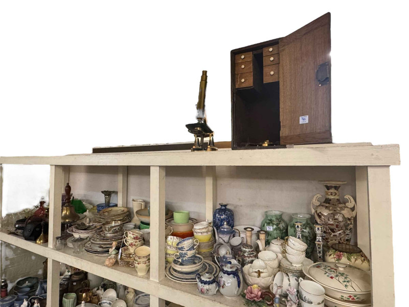 Cased microscope, two mounted silver coins including Morgan dollar, vases, teawares, china, vaseline epergne, ruby glass decanter, glass and metalwares.