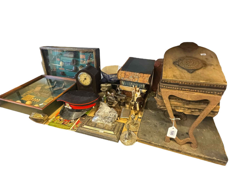 Foot bellows, military cap and buttons, framed novelties, etc.