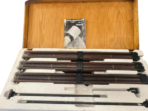 Cased Tasco Model 10k astronomical telescope and accessories.