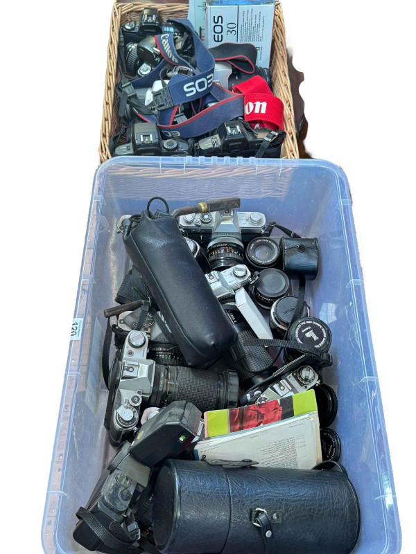 Two boxes of Canon cameras, lenses, etc.