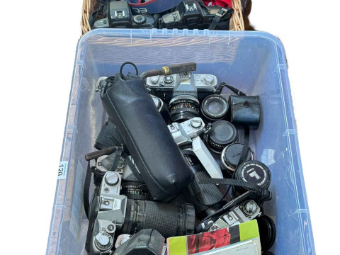 Two boxes of Canon cameras, lenses, etc.