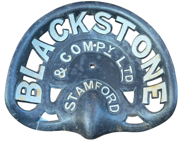 Cast metal tractor seat advertising Blackstone and Company Ltd Stamford.