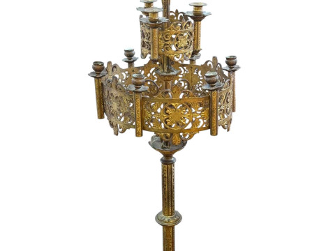 Ornate gilt metal Gothic two tier candle stand.