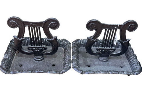 Pair of cast metal boot scrapers.