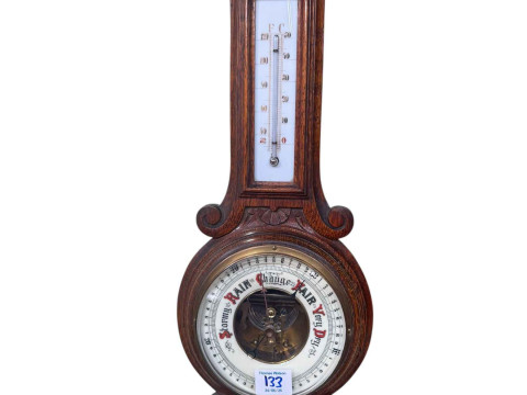 Victorian brass oil lamp with clear glass reservoir and ruby shade, and oak barometer. thumbnail