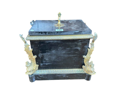 Ebonised wood box with ornate brass dolphin mounts.