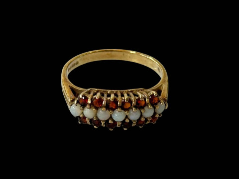 Opal and garnet 9 carat gold rings, size Q.