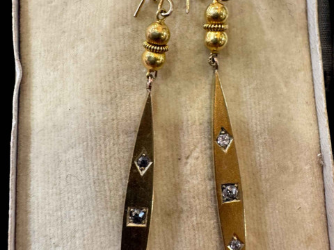 18 carat gold and diamond ear pendants.