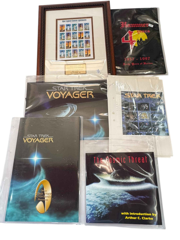 Star Trek telephone cards and stamps, Hammer and Cosmic Threat phone cards, and framed New England Lighthouses.
