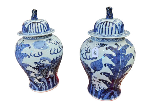 Pair of large Chinese blue and white lidded ovoid jars and covers decorated...
