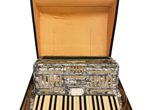 Traviata piano accordion with case.