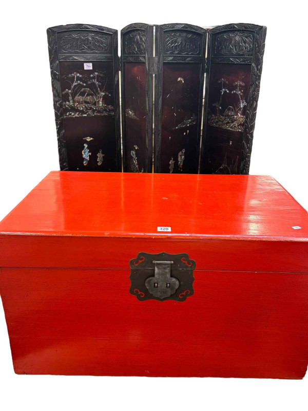 Oriental style red painted trunk and four fold screen with painted and mother of pearl decorated panel.