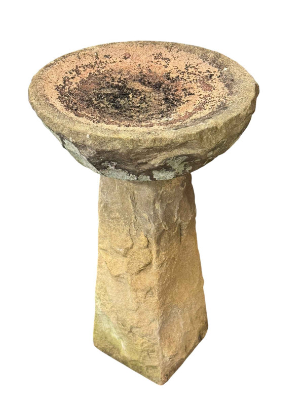Weathered stone bird bath, 61cm by 36cm diameter.